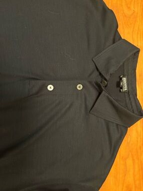 Ermenegildo Zegna Men's Black Polo Shirt.
High performance 100% wool.